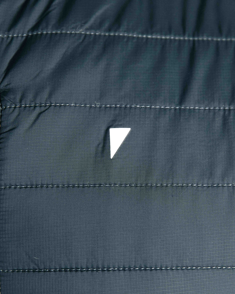 The Primo Golf Dark Gray Vest logo