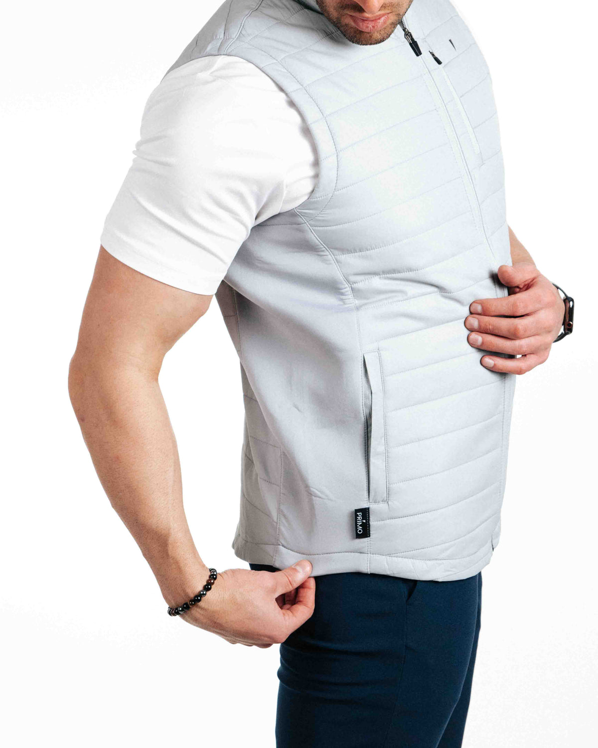 The Primo Golf Light Gray Vest side paneling